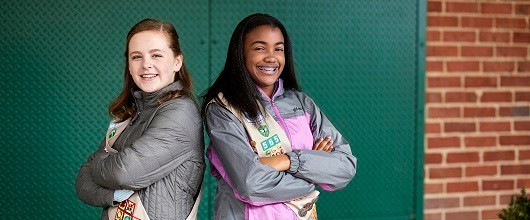 Two smiling Girl Scout Cadettes Two smiling Girl Scout Cadettes