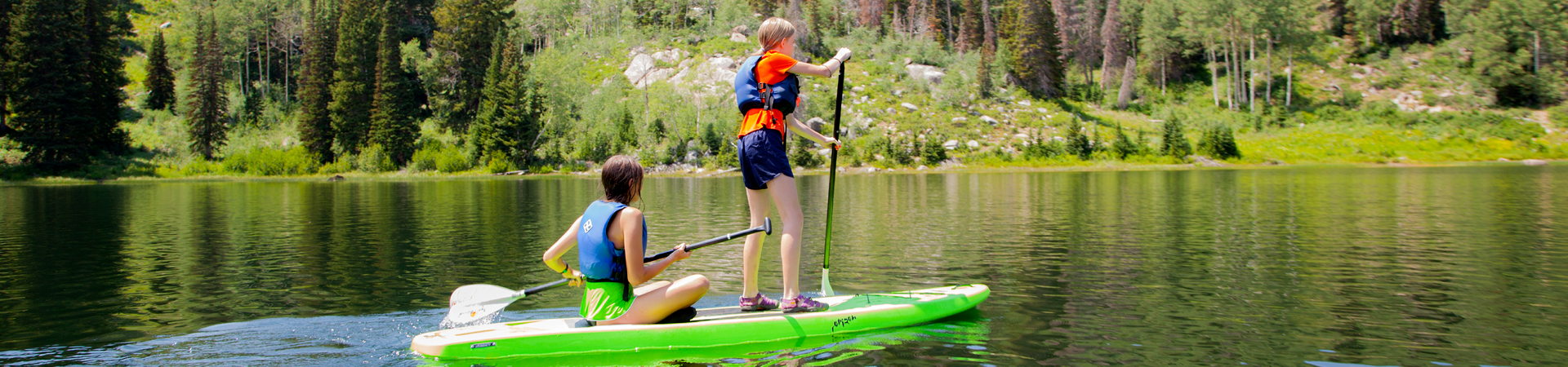  two girls out on the lake 