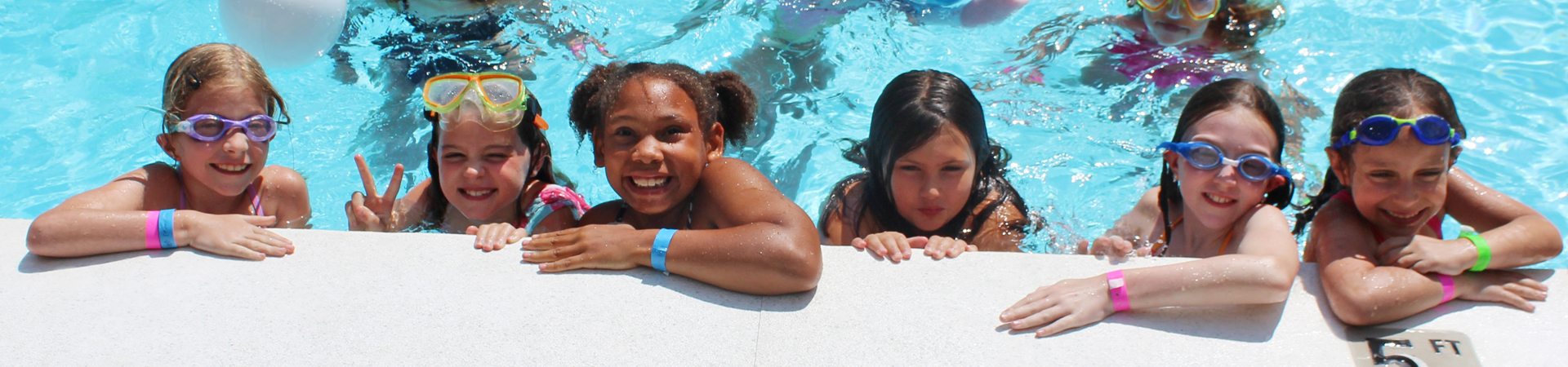  group of girls in pool at camp 