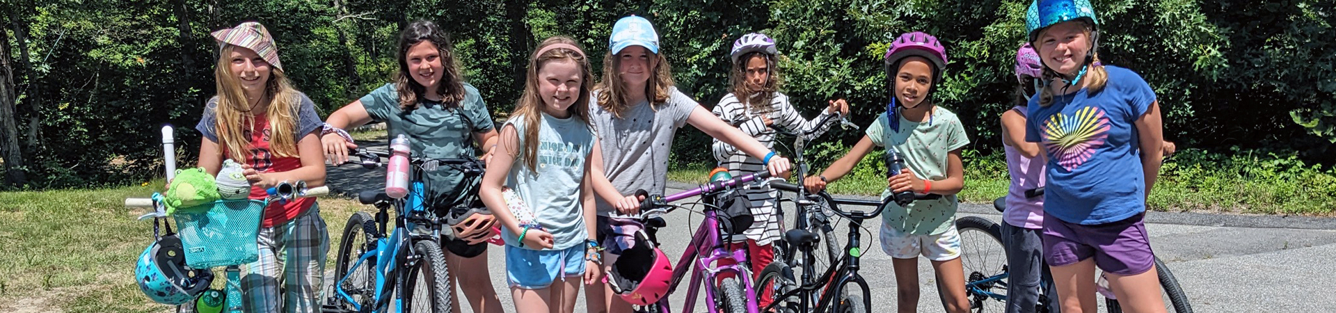  group of girls with bicycles 
