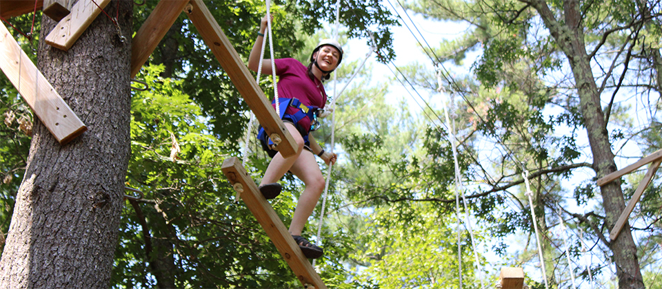  girl on ropes course 