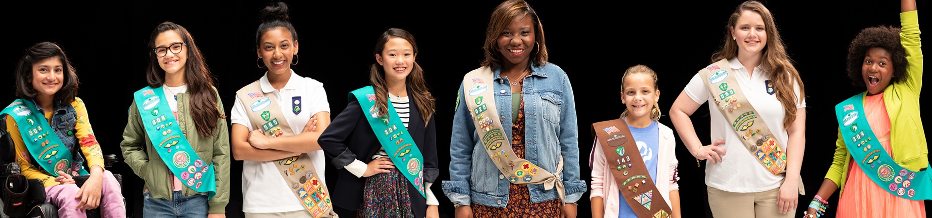  Girl Scouts of different ages and ethnicities  