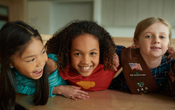 three Brownie Girl Scouts