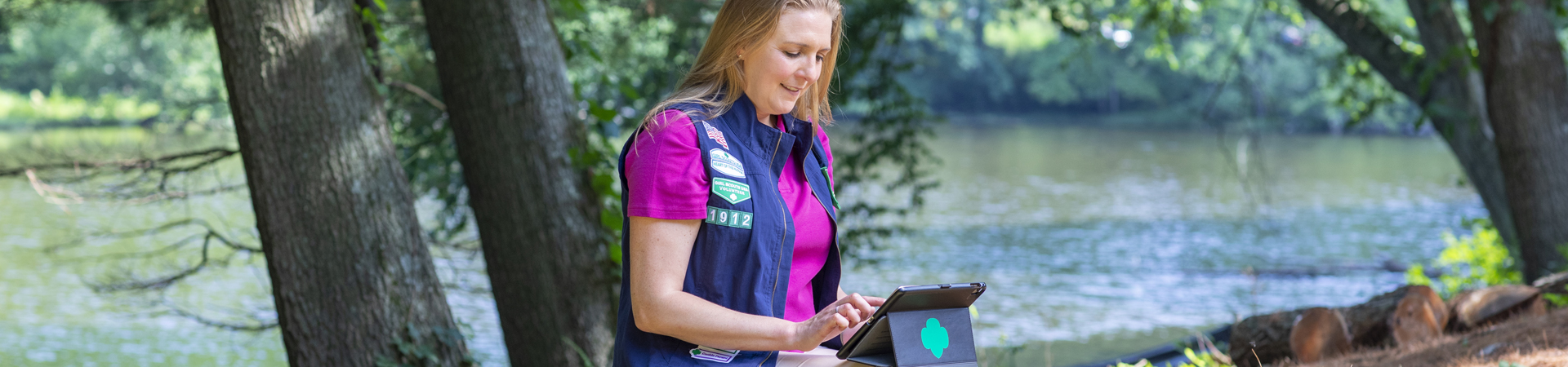  women with vest outside in the woods 